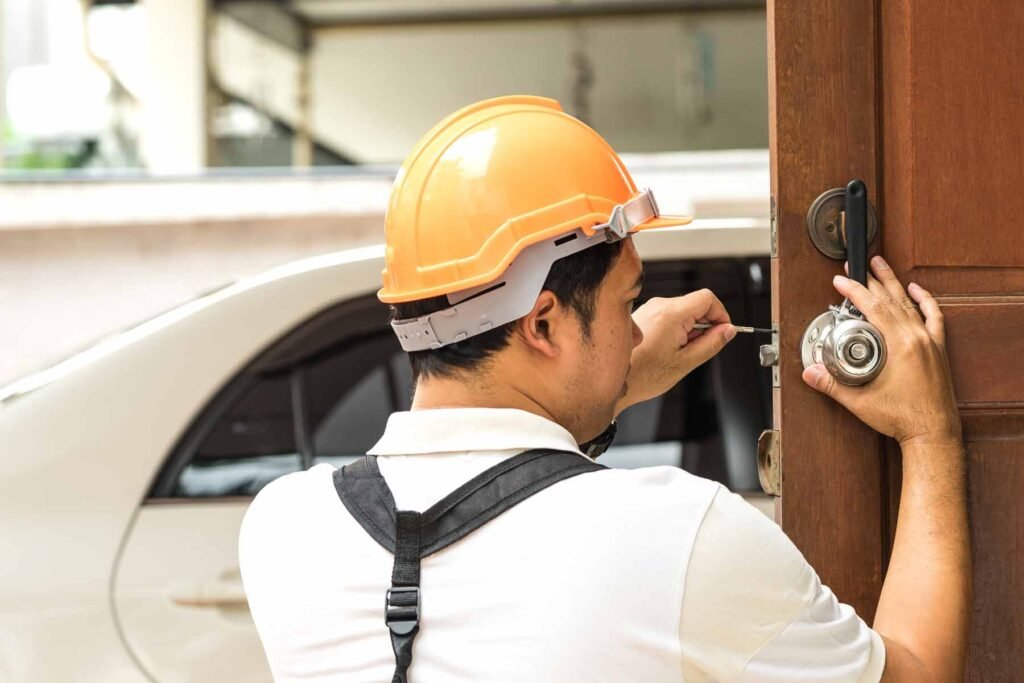 Professional locksmith repairing a door lock in Winston-Salem